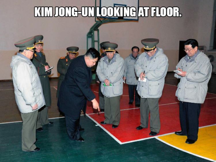 Jong-Un points at floor